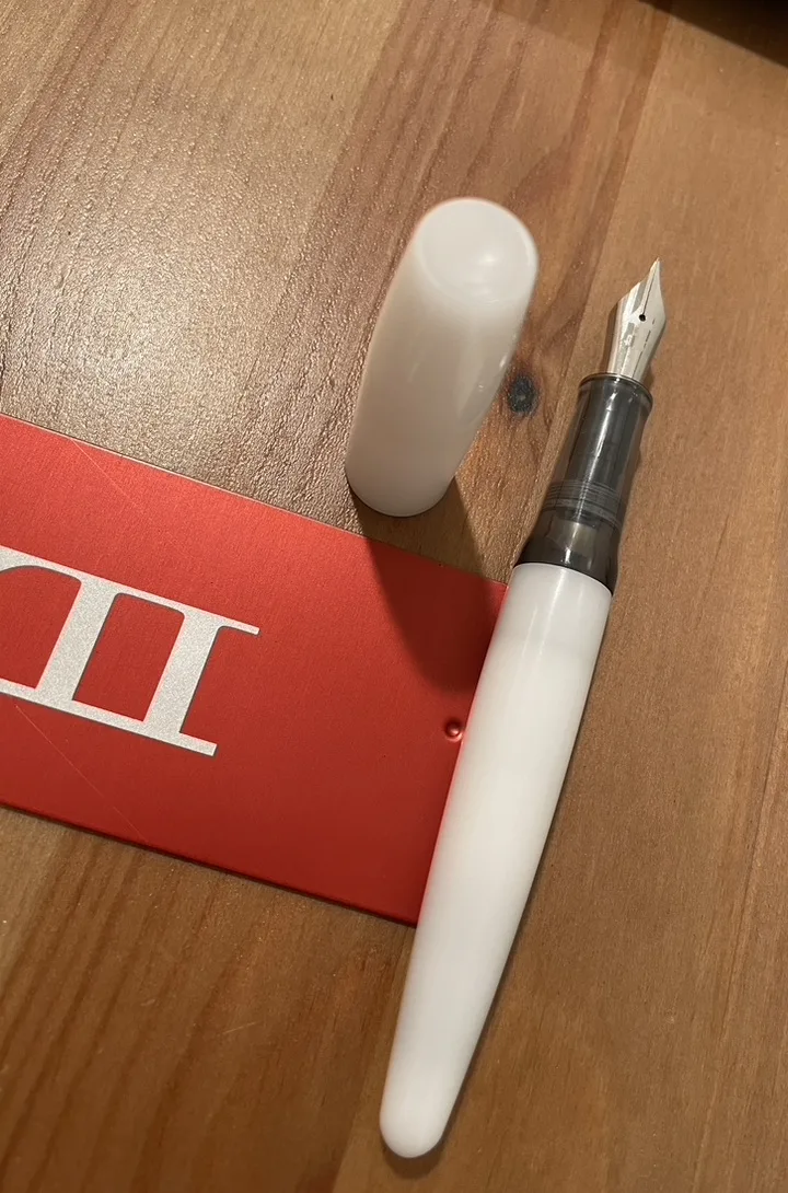 White Kaweco fountain pen uncapped